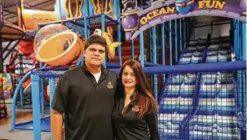  ?? Michael Minasi / Houston Chronicle ?? Castor and Tibi Colman, owners of the first Kanga’s Indoor Playcenter in the United States, pose for a photo on Monday, Nov. 6, 2017, in The Woodlands.