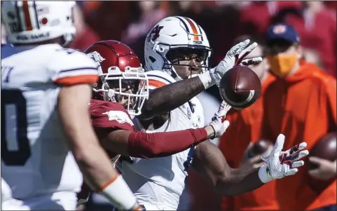  ?? (Special to the NWA Democrat-Gazette/David Beach) ?? Arkansas sophomore defensive back Myles Slusher breaks up a pass intended for Auburn running back Tank Bigsby during last Saturday’s game in Fayettevil­le. Slusher is one of several younger players taking more prominent roles in the Razorbacks’ defensive backfield.