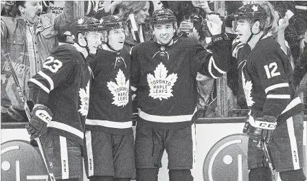  ?? CHRIS YOUNG THE CANADIAN PRESS ?? Toronto faces Boston with a mix of veterans and young stars including, from left, Travis Dermott, Mitch Marner, Nazem Kadri and Patrick Marleau.