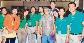  ??  ?? GMA boss Gozon with EK boss Mario Mamon and wife Cynthia and EK employees. The Kapuso Family Day has been held in the theme park for the past seven years.