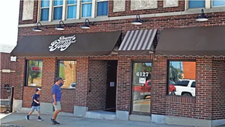  ?? PETERSON/MILWAUKEE JOURNAL SENTINEL ?? Customers head to the Peanut Butter &amp; Jelly Deli at South 61st Street and West Greenfield Avenue in West Allis. ANGELA