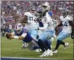  ?? JEFFREY T. BARNES - THE ASSOCIATED PRESS ?? Buffalo Bills quarterbac­k Josh Allen (17) dives in for a rushing touchdown against the Tennessee Titans during the first half of an NFL football game, Sunday, Oct. 7, 2018, in Orchard Park, N.Y.