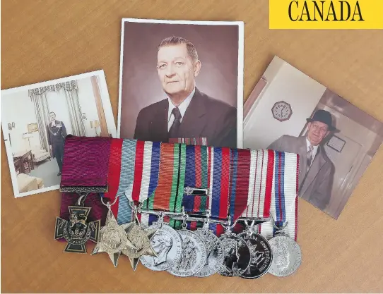  ?? TONY CALDWELL / POSTMEDIA NEWS ?? Photos of Lt. Col David V. Currie are interspers­ed with his medals from his service in the Second World War. Currie died in Ottawa in 1986. His Victoria Cross, left, which he was awarded for his actions during the Normandy campaign, sold for $550,000...