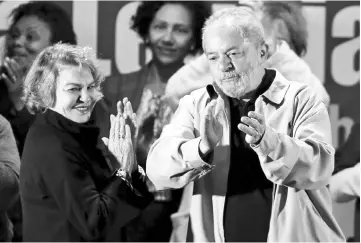  ??  ?? Brazil’s former President Luiz Inacio Lula da Silva and his wife Marisa Leticia attend a meeting with people from pro-democracy movements in Santo Andre, Brazil. — Reuters photo