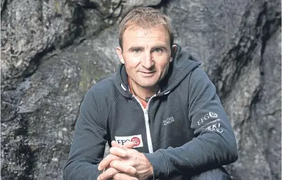  ?? AP. ?? Renowned climber Ueli Steck conquered the north face of the Eiger in two hours 47 minutes.