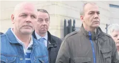  ??  ?? Alex McCrory (left) with Colin Duffy (right) outside court