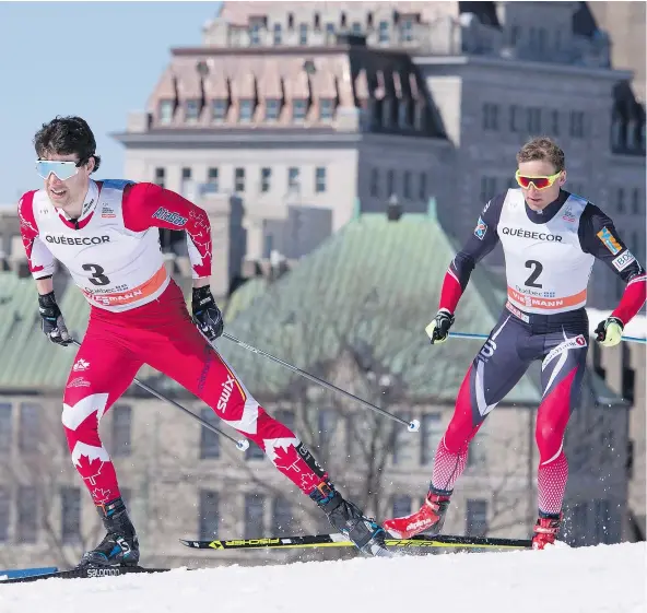  ?? — THE CANADIAN PRESS ?? Canada’s Alex Harvey, left, and Niklas Dyrhaug of Norway race in the men’s World Cup 15-kilometre freestyle pursuit Sunday in Quebec City. Harvey finished just ahead of Dyrhaug for silver, while Johannes Hoesflot Klaebo of Norway won gold.