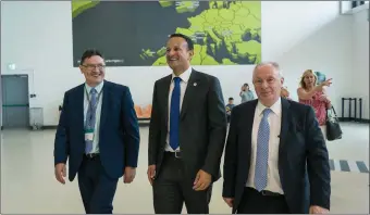  ??  ?? An Taoiseach Leo Varadker TD and Michael Ring TD, Minister for Rural and Community Developmen­t are welcomed to Ireland West Airport Knock by Joe Gilmore, CEO. Photo : Keith Heneghan