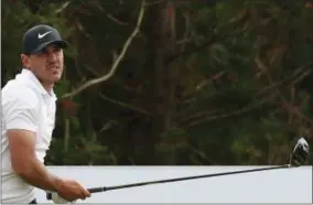  ?? PARK JI-HO/ YONHAP VIA AP ?? Brooks Koepka of the United States watches his shot on the 18th hole during the final round of the CJ Cup PGA golf tournament at Nine Bridges on Jeju Island, South Korea, Sunday, Oct. 21, 2018.