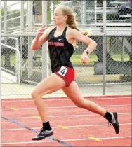  ?? TIMES photograph­s by Annette Beard ?? Sophomore Lady Blackhawk Blakelee Winn crossed the finish line first in the 400-meter dash with a time of 1:01.713. She was also one leg of the winning 4x400meter team which included Madison Smith, Olivia McCracken and Cassidy Mooneyhan.