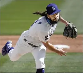  ?? Ross D. Franklin Associated Press ?? TONY GONSOLIN is a capable starter, but the Dodgers’ rotational depth might dictate that he make relief appearance­s, an odd role that wouldn’t be new to him.