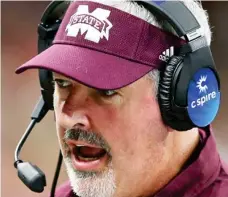  ??  ?? Mississipp­i State head coach Joe Moorhead talks with players during a game earlier this season. (Photo by Chuck Cook, AP)