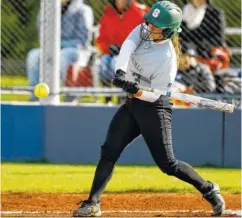  ?? STAFF PHOTO BY C.B. SCHMELTER ?? Silverdale Baptist Academy’s Savannah Turner connects for a triple against Chattanoog­a Christian School at CCS on Wednesday. The visiting Lady Seahawks won 7-0.