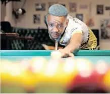  ?? | SHELLEY KJONSTAD ?? BLACK Ball pool champion Mongezi Moeketsi from Clermont shows his skills on a pool table at Vill-Inns Sports Pool Bar. African News Agency (ANA)