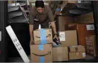  ?? LYNNE SLADKY — ASSOCIATED PRESS ARCHIVES ?? As Amazon’s Prime Day has gained steam, other retailers have created “savings events” to compete with the online giant.