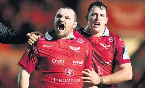  ??  ?? Scarlets hooker Ken Owens celebrates after scoring against Leicester in the Heineken Champions Cup in January.