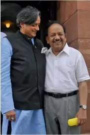  ?? PRITAM BANDYOPADH­YAY ?? Science and technology minister Harsh Vardhan and Congress MP Shashi Tharoor at Parliament House during the ongoing Budget Session in New Delhi on Monday.
—