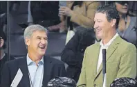  ?? AP PHOTO ?? Team Lemieux coaches Bobby Orr, left, and Mario Lemieux laugh during first period of the NHL All-Star Celebrity Shootout on a Jan. 28.