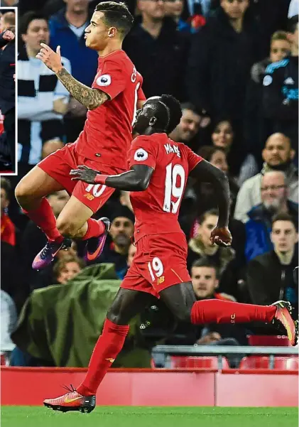  ?? — AFP / Reuters ?? Looking Red-hot: Liverpool’s Philippe Coutinho celebratin­g with Sadio Mane after scoring the second goal against West Bromwich Albion in the English Premier League match at Anfield on Saturday. Liverpool won 2-1. Inset: Liverpool manager Juergen Klopp...