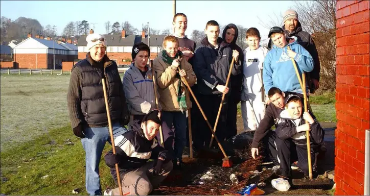  ??  ?? Cox’s Clean Up......Stephen Hutchinson, (Bottom Left) Vincie McGrory, James Cooney, Padraig O’Rourke, Chris Finegan, Patrick McDonald, Paul Tuite, Aaron Fretwell, Deco Moran, John Mulligan, Jamie Clarke and Patrick English who are taking part in a clean up of Cox’s Demense in January 2004.