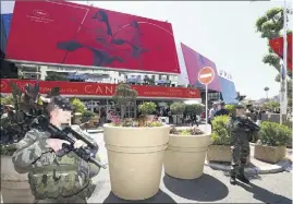  ?? (Photos Patrice Lapoirie) ?? Les militaires de l’opération Sentinelle sont associés à ce dispositif de sécurisati­on d’une ampleur inégalée.