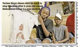  ??  ?? Yerime Dieye shows shirt he used to stop bleeding after 6-year-old cousin Mohammed Dieye (r.) was slashed.