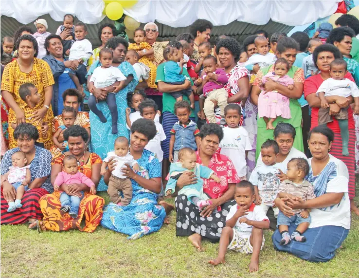  ?? Photo: DEPTFO News ?? Assistant Minister for Health and Medical Services Alexander O’Connor with parents, guardians and their children at the Bua Subdivisio­nal Hospital in Nabouwalu on August 1, 2017.