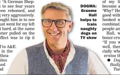  ??  ?? DOGMA: Graeme Hall helps to train naughty dogs on TV show