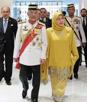  ?? — Bernama ?? Sultan abdullah and Tunku azizah attending the coronation ceremony of King Charles III at Westminste­r abbey in London.