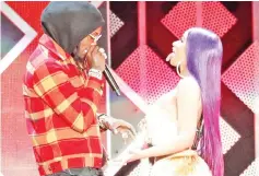  ??  ?? Cardi B and Offset perform during the Jingle Ball concert in Inglewood, California, recently. — Reuters file photo