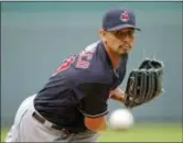  ?? CHARLIE RIEDEL — THE ASSOCIATED PRESS FILE ?? Indians starting pitcher Carlos Carrasco throws against the Royals in Kansas City, Mo. The Indians signed Carrasco to a new, four-year contract through the 2022 season.