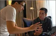  ?? RADIUS TWC ?? Edward Snowden (left) appears with Glenn Greenwald in a scene from “Citizenfou­r,” a 2014 documentar­y about Snowden’s leak of NSA documents. A top U.S. official said only 1 percent of classified informatio­n shared by Snowden has been released by...