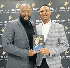  ?? Picture: SIBONGILE NGALWA ?? REVEALING: Former Springbok player Thando Manana, left, and author Sibusiso Mjikeliso, at the launch of his book ‘Being a Black Springbok: The Thando Manana story’ in East London last night