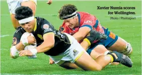  ?? Photo / Photosport ?? Xavier Numia scores for Wellington.