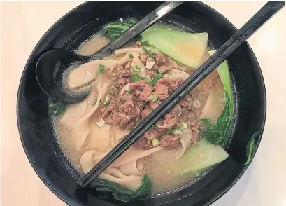  ?? AMY PATAKI ?? Hand-ripped noodles form the basis of this lamb soup at Noodle &amp; More on Bloor St. W and Brunswick Ave.