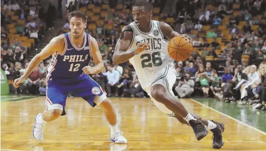  ?? HERALD FILE PHOTO ?? LOOK WHAT I CAN DO: Restricted free agent guard Jabari Bird hopes his play for the Celtics during the NBA Summer League in Las Vegas was enough to earn him more time in the NBA, either with the Green or another team.