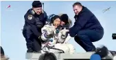  ?? (DM) ?? NASA astronaut Christina Koch gives a thumbs up and a huge smile after a 328-day mission