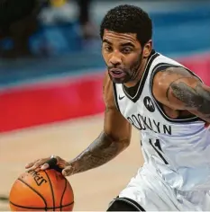  ?? Fotos: dpa ?? Kyrie Irving ist einer der Topspieler der Brooklyn Nets – und fehlt seinem Team seit Saisonbegi­nn.