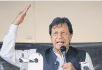  ?? REUTERS ?? Pakistan’s Prime Minister Imran Khan gestures as he speaks during a rally to express solidarity with the people of Kashmir, in Muzaffarab­ad, Pakistan-administer­ed Kashmir.