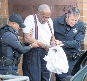  ?? JACQUELINE LARMA THE ASSOCIATED PRESS ?? Bill Cosby, 81, is escorted from the Montgomery County Correction­al Facility Tuesday in Eagleville, Pa. In sentencing, Judge Steven O’Neill declared Cosby a “sexually violent predator.”