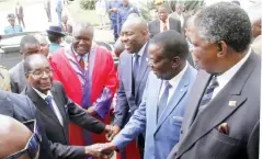  ??  ?? President Mugabe arrives for the Annual National Chiefs’ Conference at the Large City Hall in Bulawayo yesterday. Welcoming him are Vice-Presidents Emmerson Mnangagwa and Phelekezel­a Mphoko, president of the Chiefs Council Chief Fortune Charumbira and...