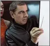  ?? Strikes Again. Johnny English ?? Johnny English (Rowan Atkinson) returns because, well, James Bond is unavailabl­e and no one can figure out anything else to do in David Kerr’s spy spoof