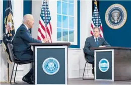  ?? EVAN VUCCI/AP ?? Secretary of State Antony Blinken listens as President Joe Biden delivers remarks Friday to the Major Economies Forum on Energy and Climate in Washington.