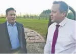  ?? BY JOHN MCCASLIN ?? Republican candidate Corey Stewart (right) is greeted by a supporter upon arrival at Gadino Cellars last Thursday evening.