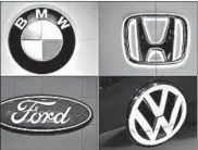  ?? STAN HONDA/GETTY-AFP ?? The deal between Honda, VW, Ford and BMW to agree to stricter emissions standards is under investigat­ion,