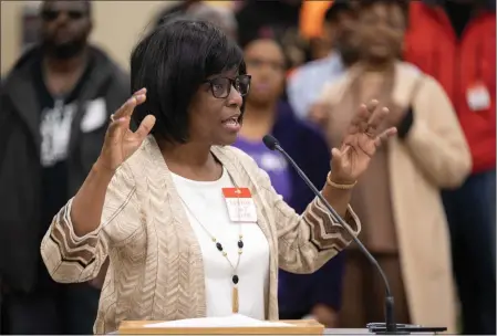  ?? PHOTOS BY PAUL KITAGAKI JR. — THE SACRAMENTO BEE ?? Gloria Pierrot-Dyer, of Roseville, speaks during the public comment portion of the Reparation­s Task Force meeting in Sacramento on Friday.