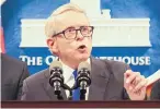  ?? JOSHUA A. BICKEL /THE COLUMBUS DISPATCH/AP ?? Ohio Gov. Mike DeWine announced a package of proposals on background checks earlier this week.