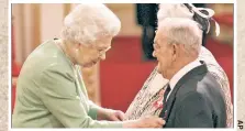  ??  ?? ANGRY: Iraqi war refugee Ahmed Hassan (left, in court drawing Friday) was taken in by foster parents Penelope and Ronald Jones (receiving the Order of the British Empire from Queen Elizabeth in 2010, above).