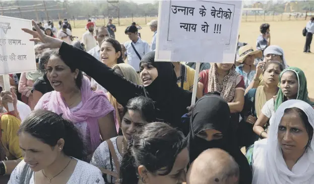  ?? PICTURE: GETTY IMAGES ?? Activists in Mumbai take part in a protest over atrocities perpetrate­d against women yesterday