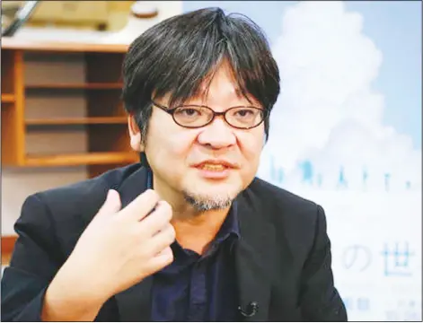  ??  ?? In this Sept 30, 2016 photo, Japanese animation director Mamoru Hosoda speaks during an interview with The Associated Press at his Chizu Studio in suburban
Tokyo. (AP)